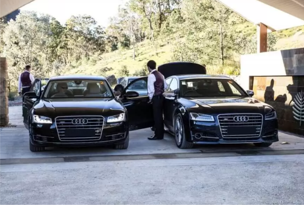 Luxury school formal chauffeur car hire service Australia with black sedan and limousine